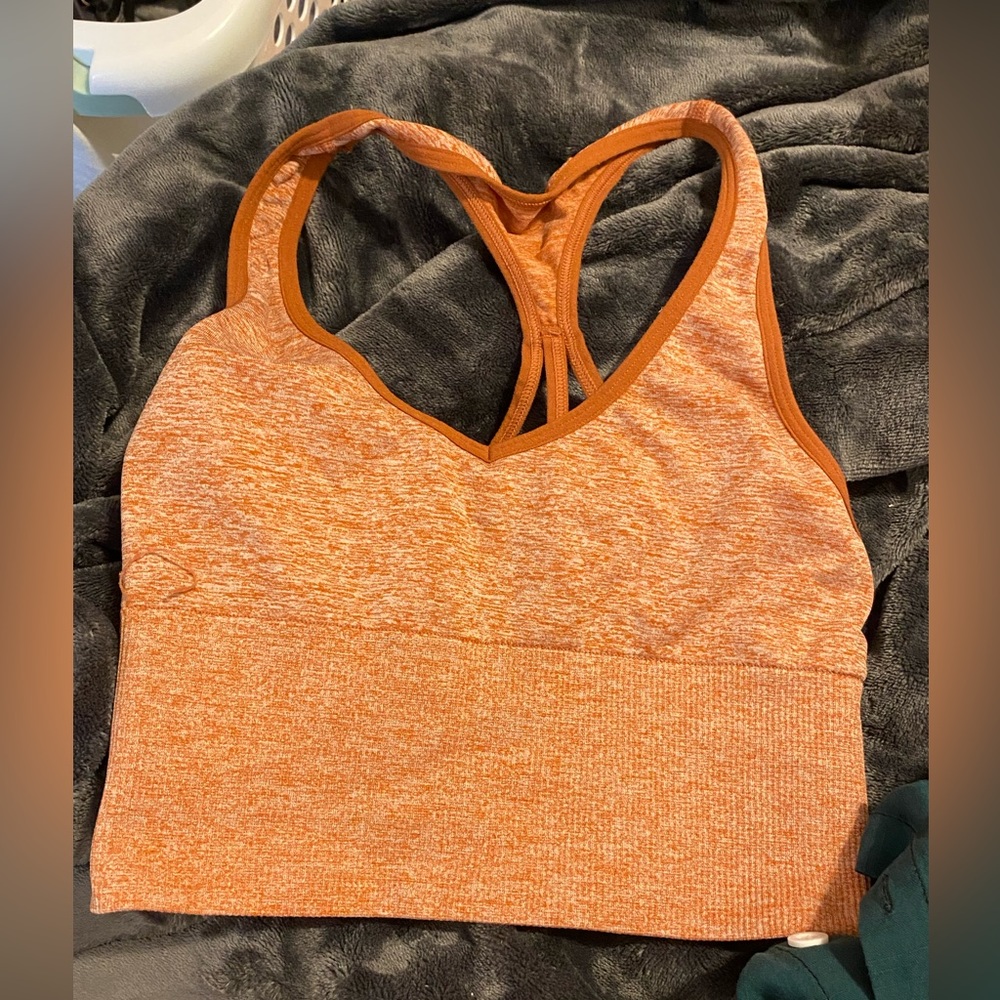 PINK rusty orange sports bra , barley worn , no stains